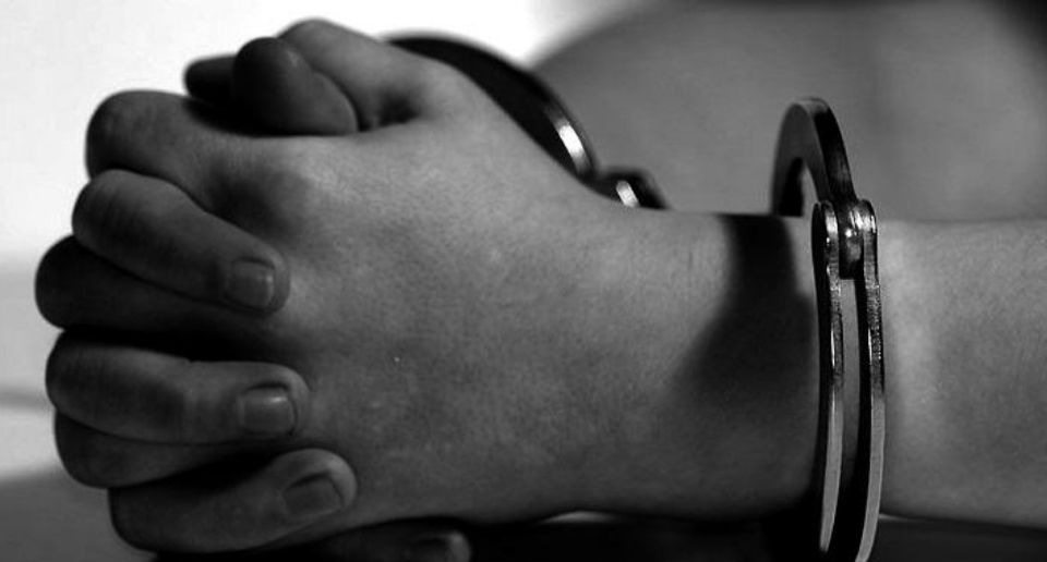 A person handcuffed