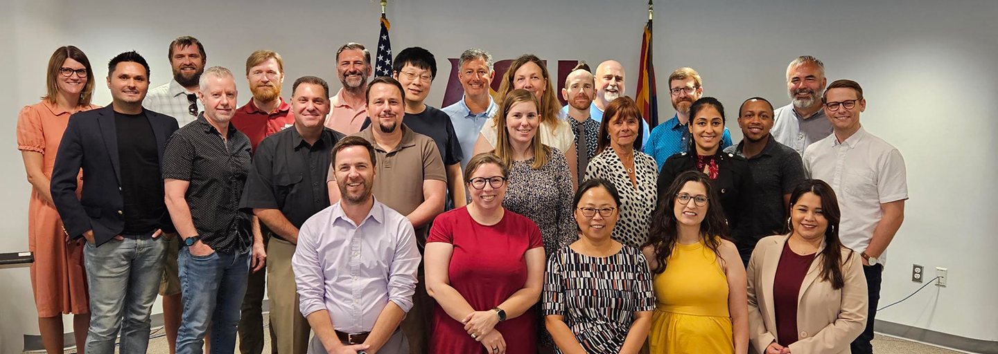 CCJ faculty members standing and smiling
